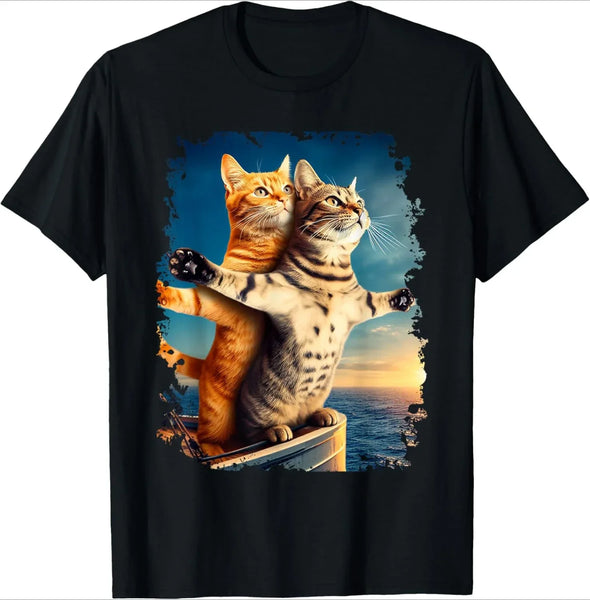 Black t-shirt with a graphic of two cats on a boat at sunset