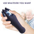 Close-up of a hand holding a dark silicone wearable with electric effects, text above, blurred couple in background.