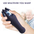 Close-up of a hand holding a dark silicone wearable with electric effects, text above, blurred couple in background.