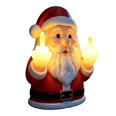 A Santa Claus figurine or lamp with a glowing warm light, showing both middle fingers, on a plain white background.