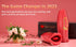 Red personal massager with floral arrangement and Touch Honey packaging on pink background