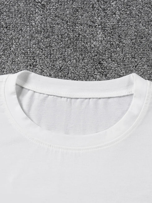 White t-shirt collar on a gray carpet background