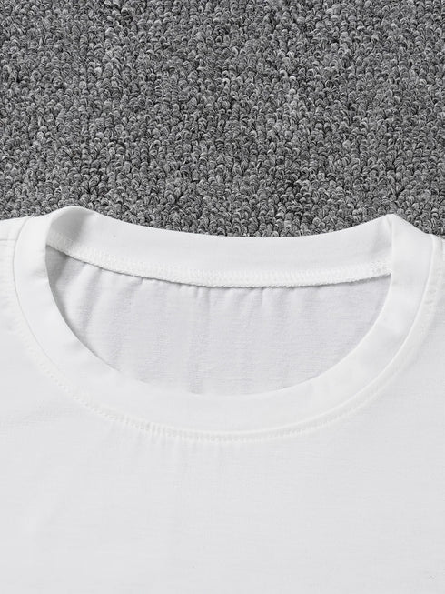 White t-shirt collar on a gray carpet background