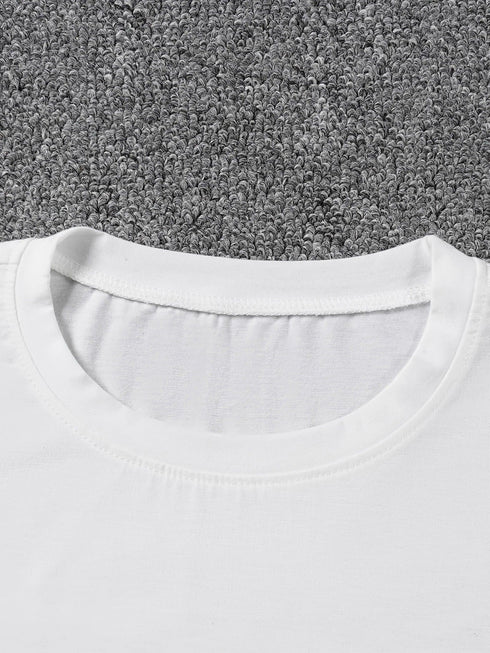 White t-shirt collar on a gray carpet background
