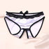 White satin lace panties with black trim, a black bow at the center front, and a black lace waistband, displayed flat on a light beige background.