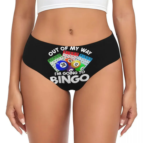Black women's bikini underwear with a colorful bingo card and billiard ball graphic and the text 'OUT OF MY WAY I'M GOING TO BINGO' worn by a model.